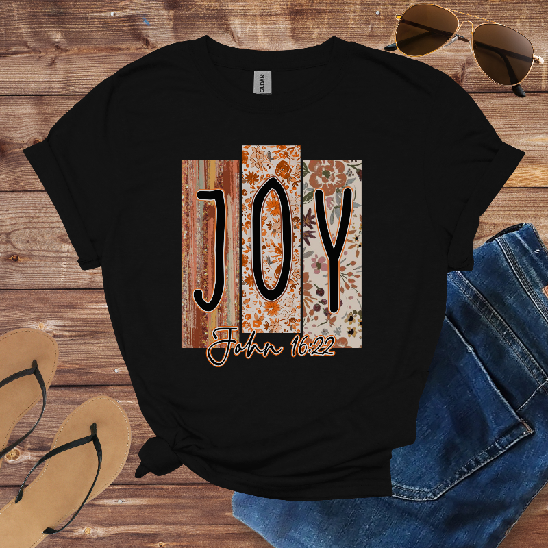 Black t-shirt with floral-patterned blocks spelling “JOY” and the text “John 16:22.